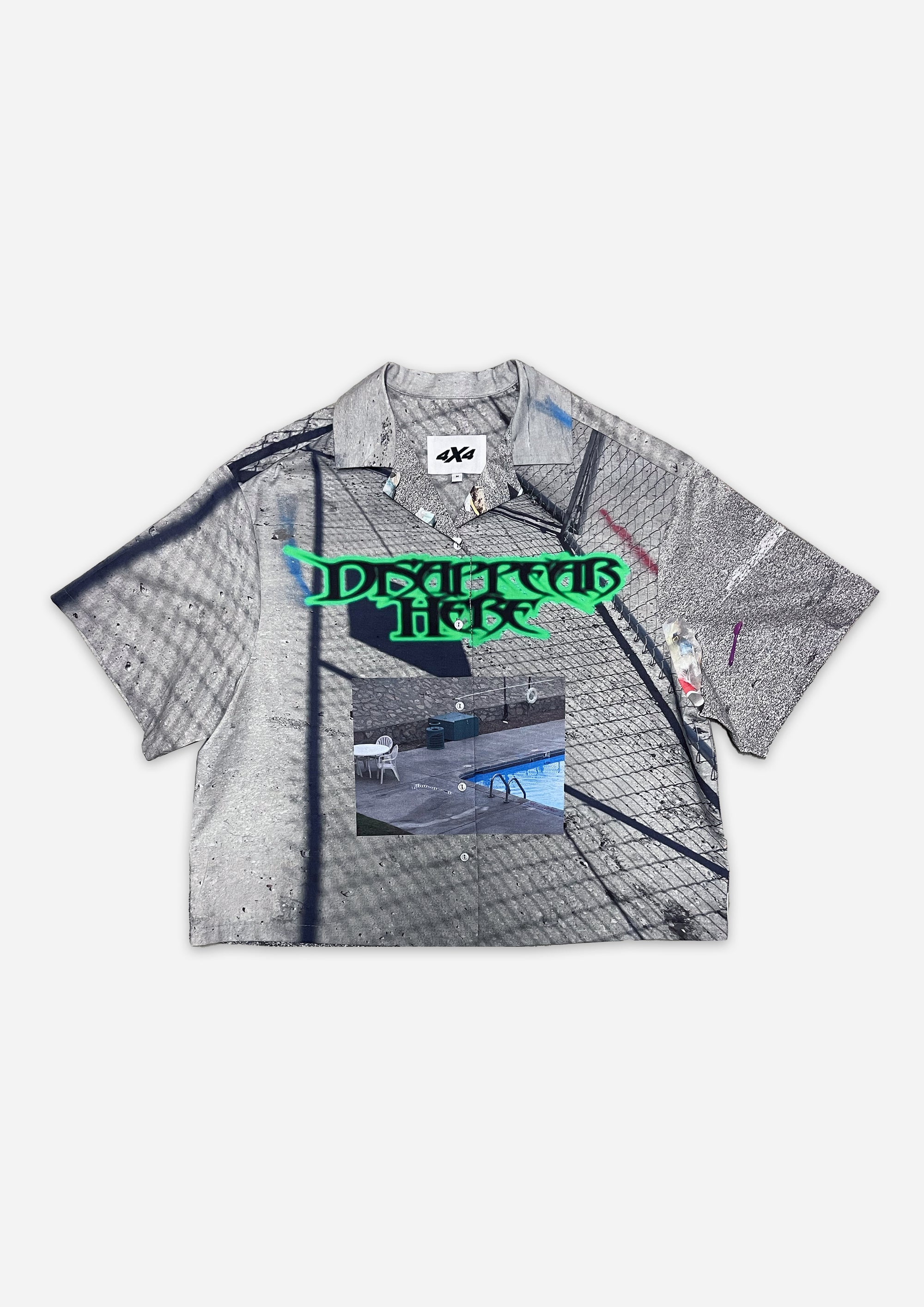 Gray polo shirt with graphic design and text on a white background