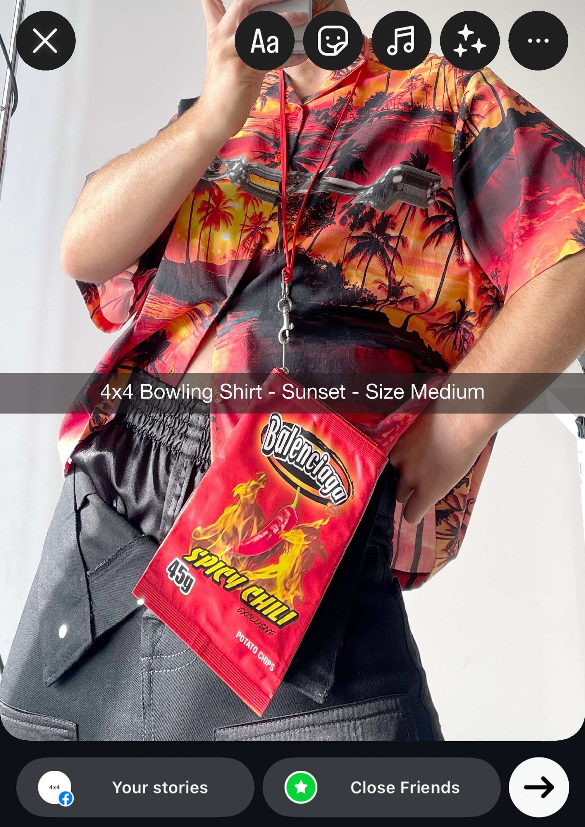 Person wearing a colorful '4x4 Bowling Shirt - Sunset' with a 'Boltinge' spicy chili packet.