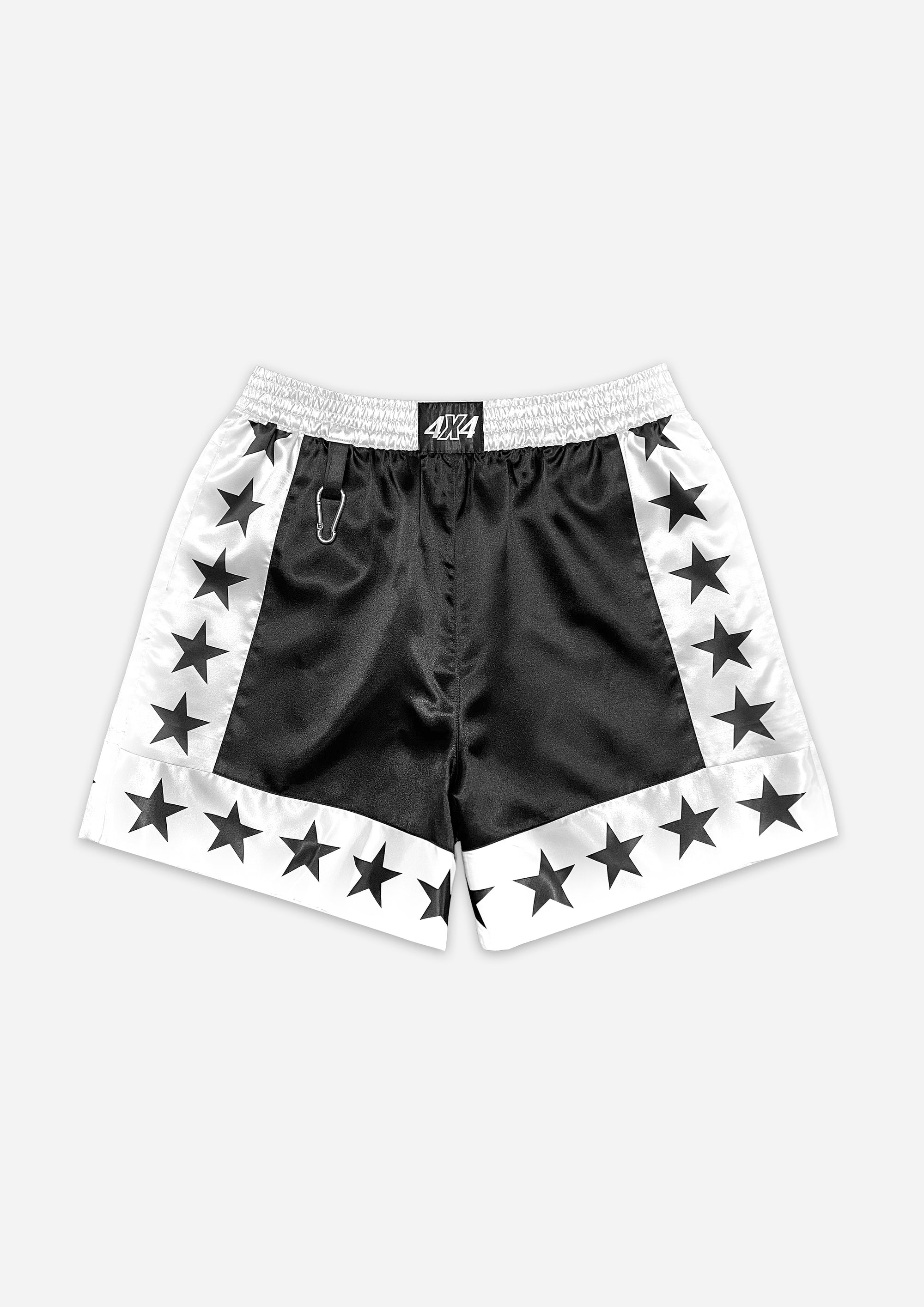 Black shorts with star patterns on a white background